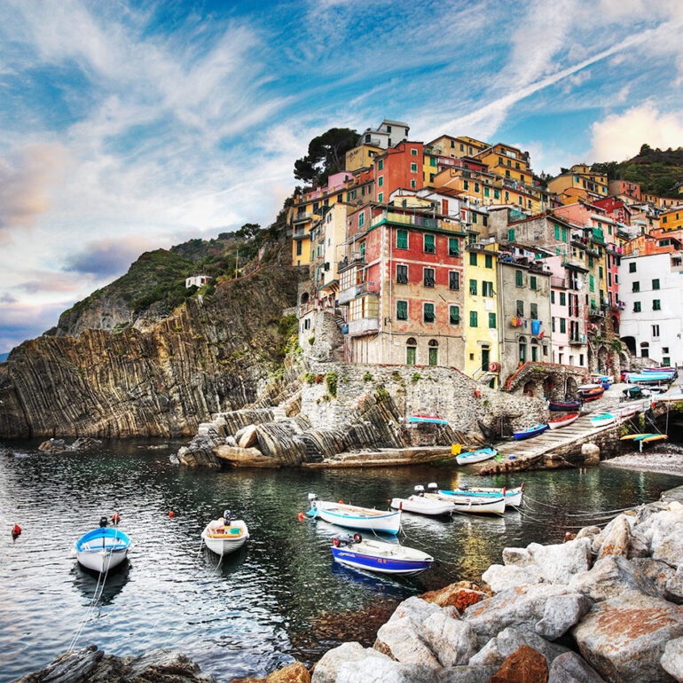 Sunrise over the harbor in Riomaggiore, Italy.