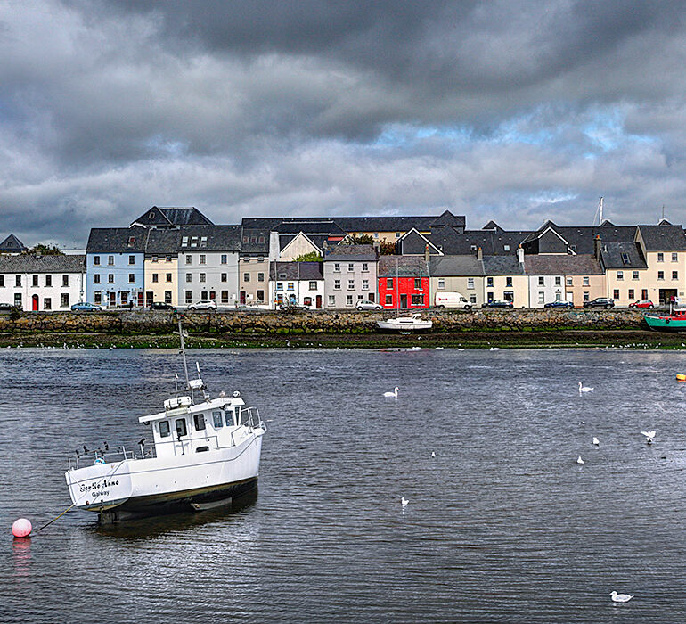 Harbor with brightly painted houses.