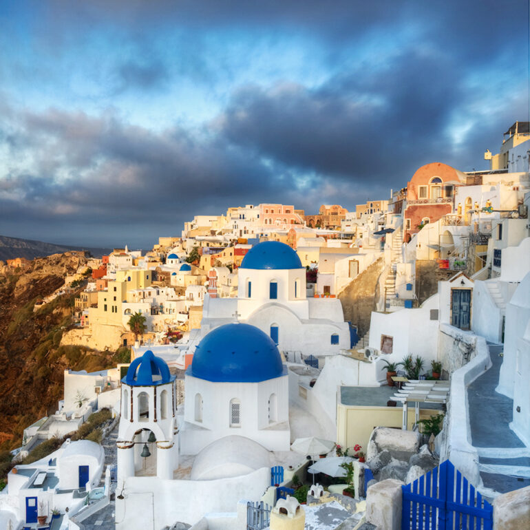 Morning lights up the cliffside of Ioa.
